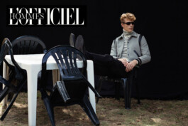 L'Officiel Hommes editorial spread, model Sven de Vries seated among white chairs, photographed by Filip Freytag 